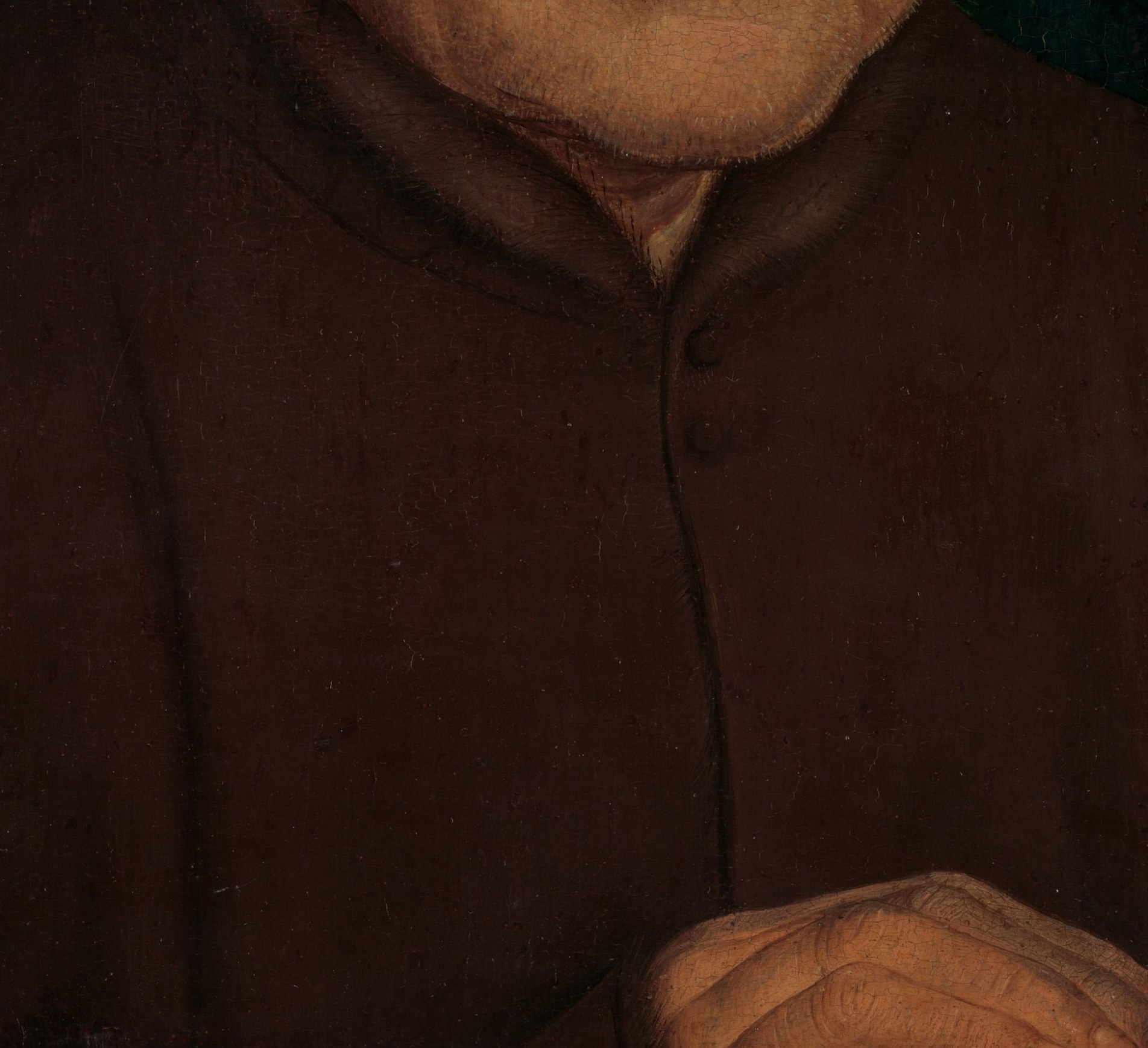 The simple robe and dark background focus on his presence.