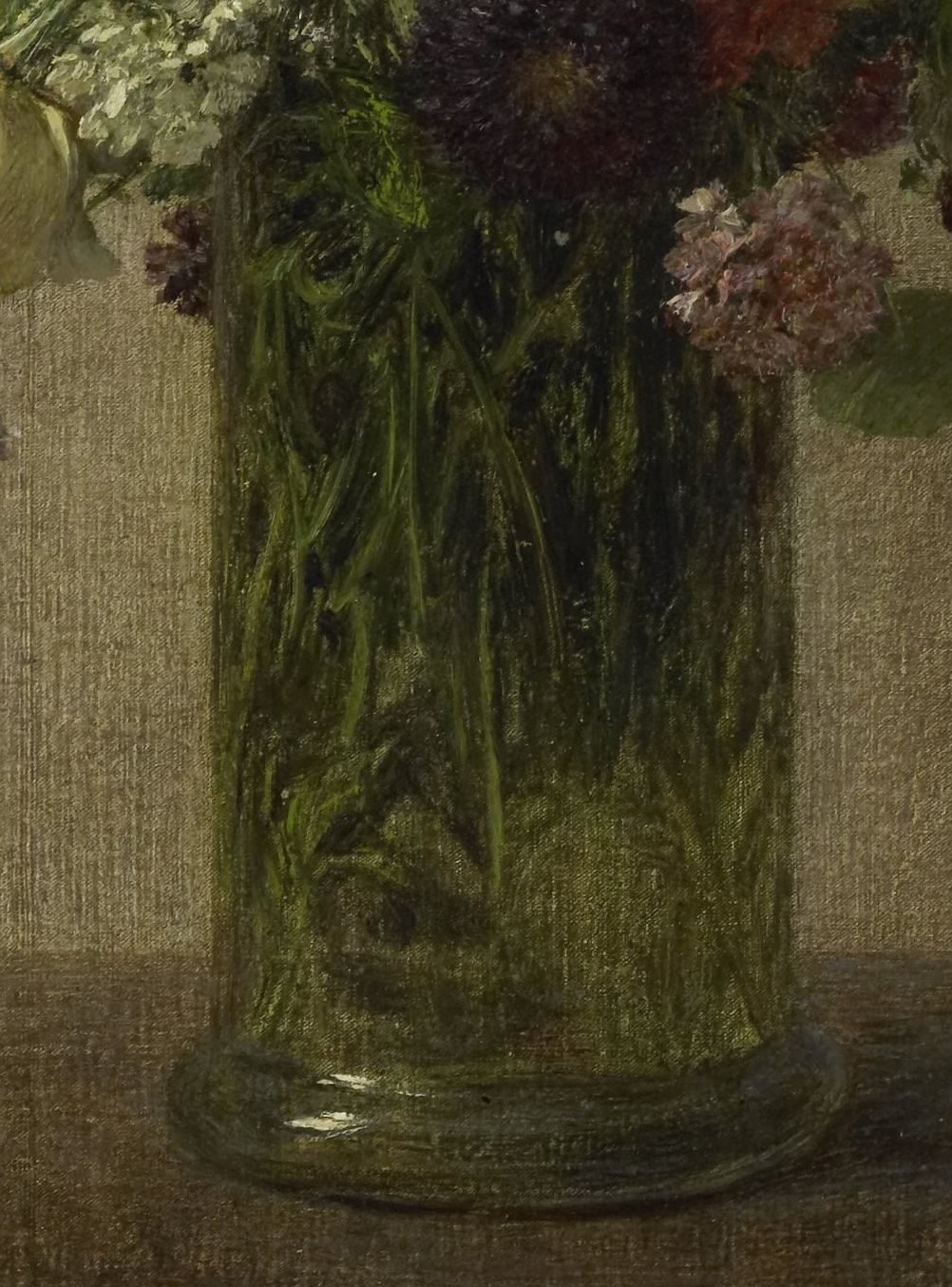 Look closely at the tall glass vase holding them.