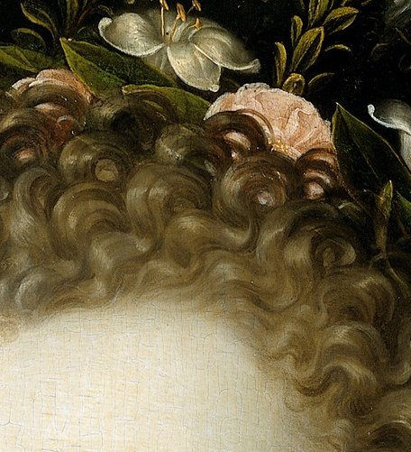 And her intricate hair ornaments are made of real flowers.