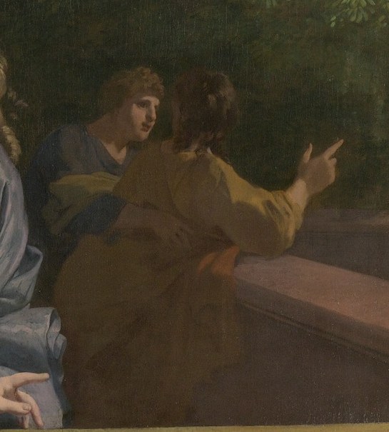 The man's gesture suggests he is directing attention or narrating.