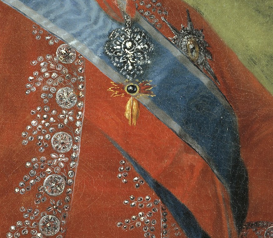 The rich blue silk, worn diagonally, adds a strong visual element and further emphasizes his royal authority.