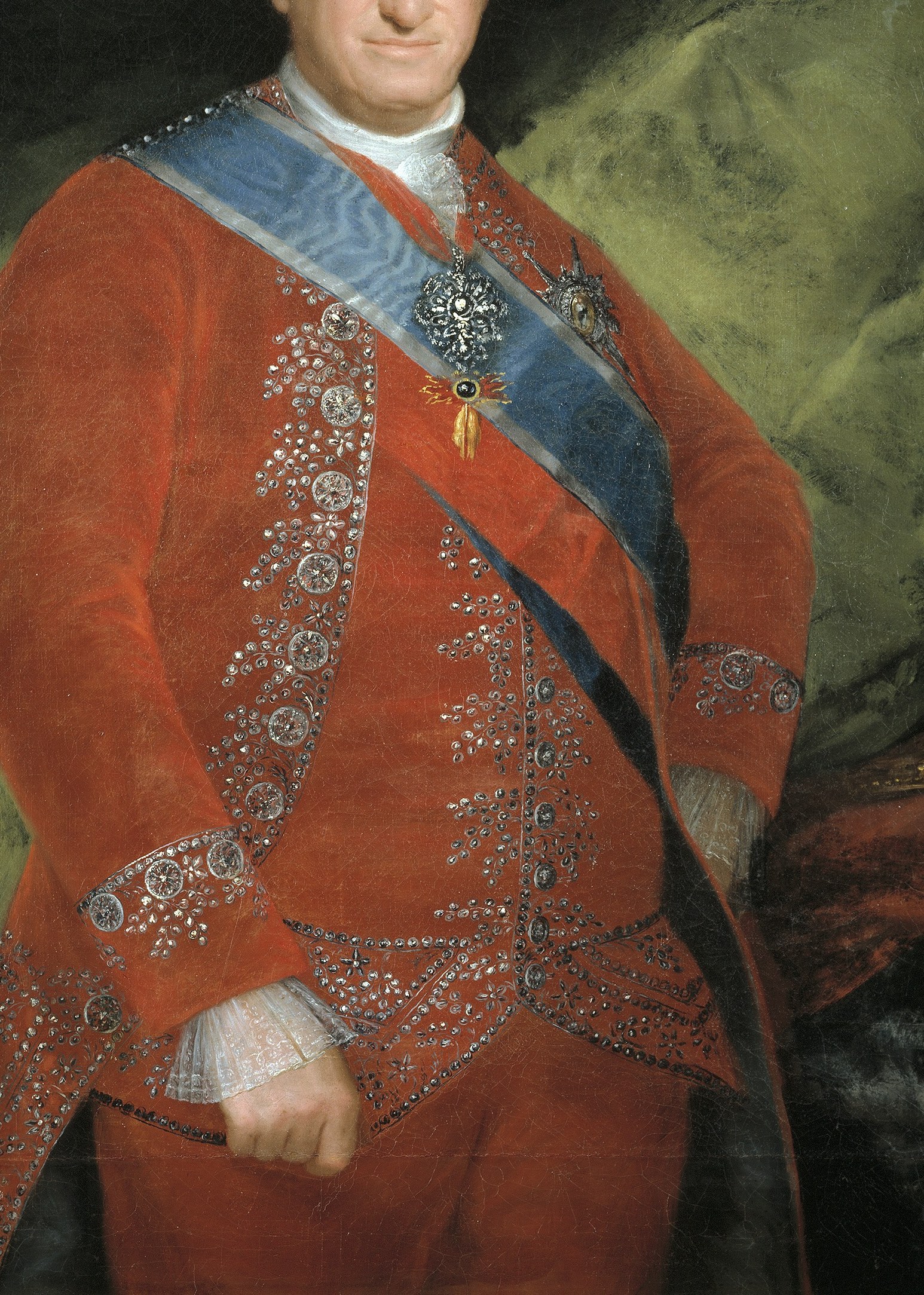 His red coat displays immense royal wealth and status.
