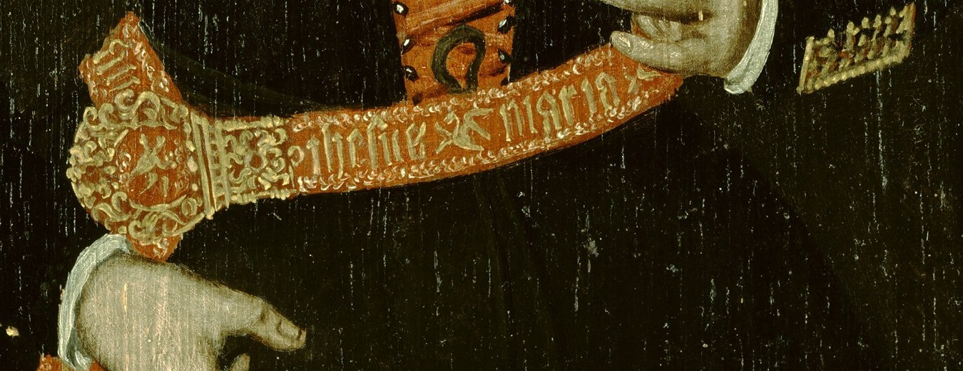 Look closely at the ornate sash.