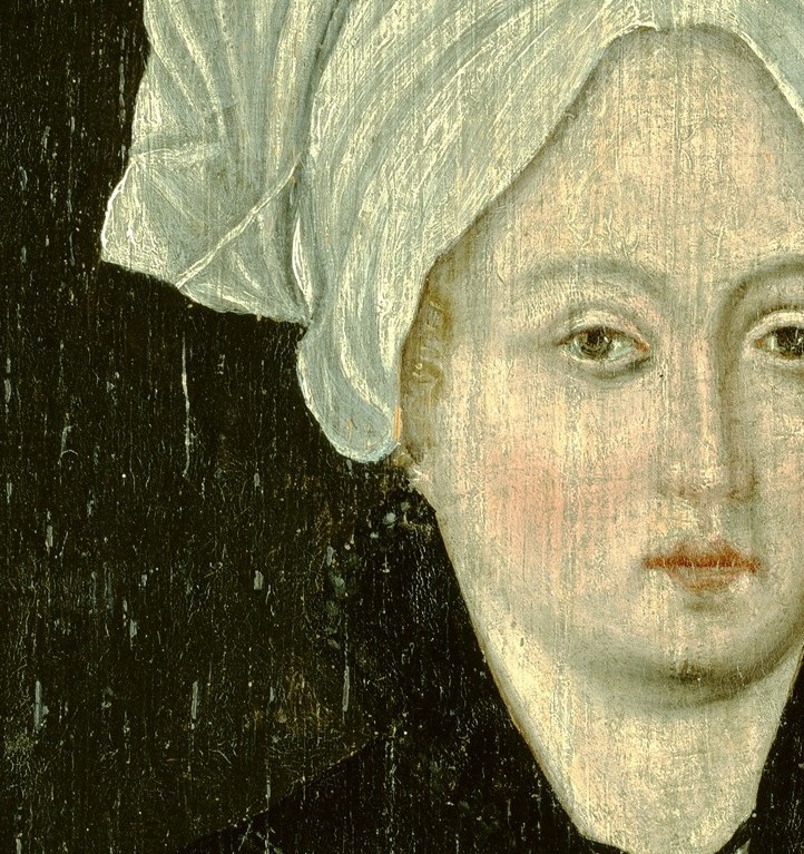 Her direct gaze is engaging and invites the viewer into the scene.