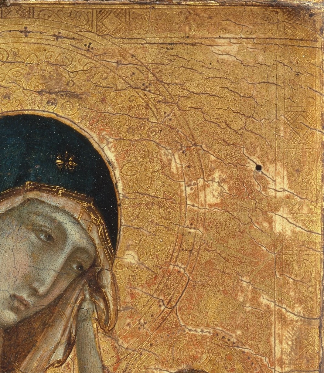 The Christ child does not look like an infant. He looks like a man.