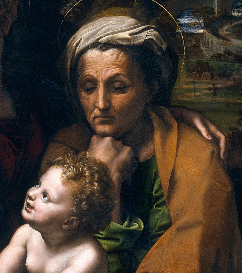 Her mother watches with quiet wisdom.