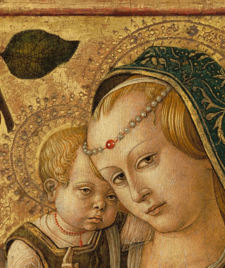 The Eleusa type , eyes cast downward in sorrowful foreknowledge rather than gazing at the viewer; the slight tilt reads as maternal tenderness and grief simultaneously.