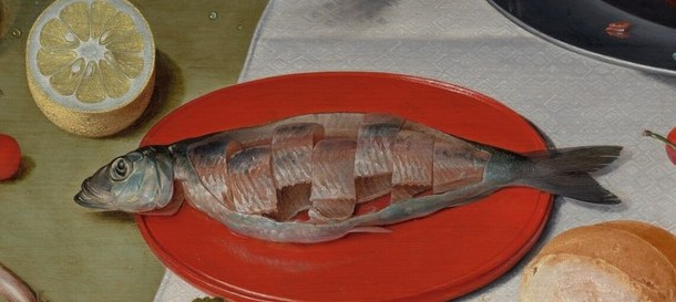 The presentation of the raw fish emphasizes the theme of sustenance and the sea's offerings.