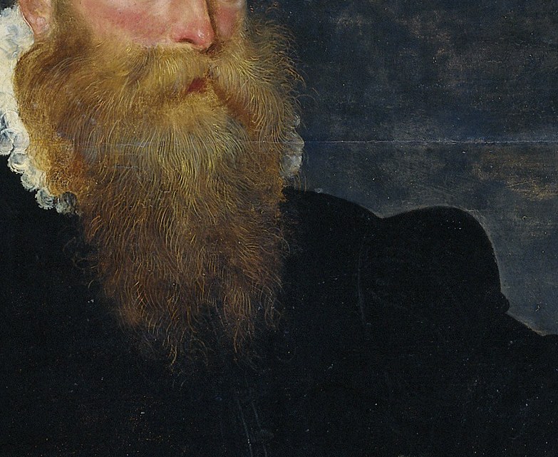 The meticulously rendered beard signifies status and maturity.