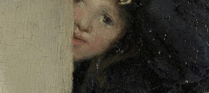 Her gaze is directed downwards, suggesting concentration or perhaps a hint of melancholy.