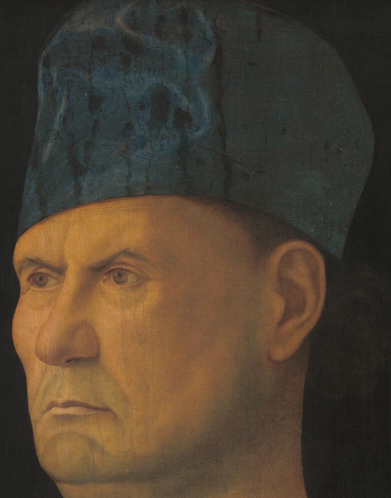 The primary psychological anchor , a weathered, composed face with an unflinching lateral gaze that reads as authority and self-possession; the slight turning creates depth characteristic of Venetian portraiture