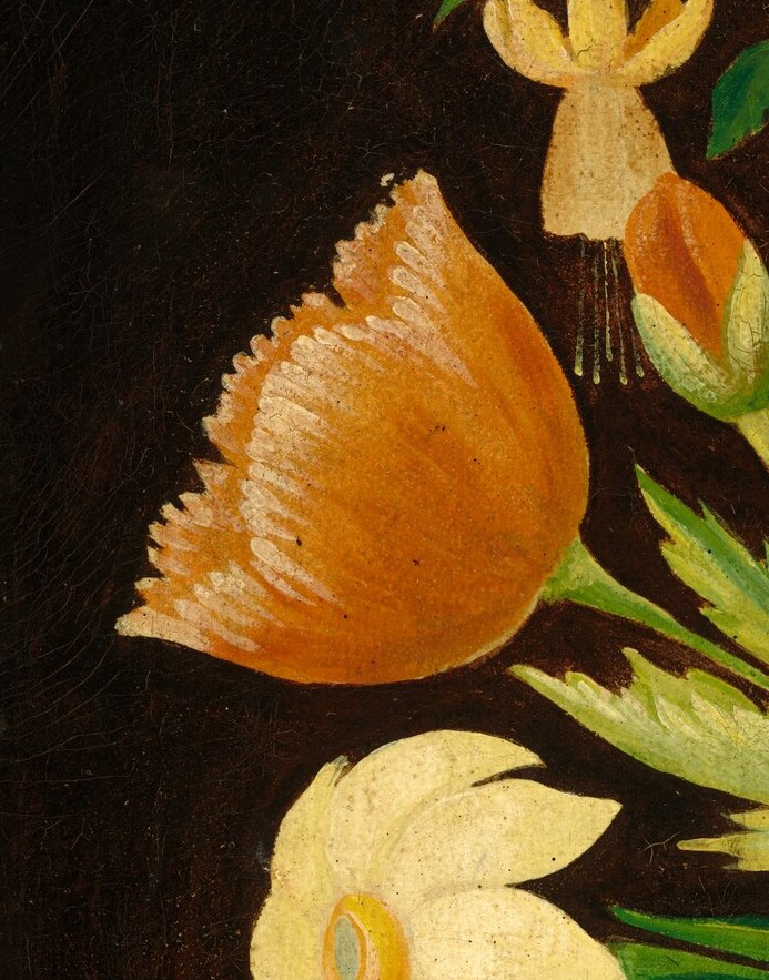 The orange tulip on the left has already begun to droop.