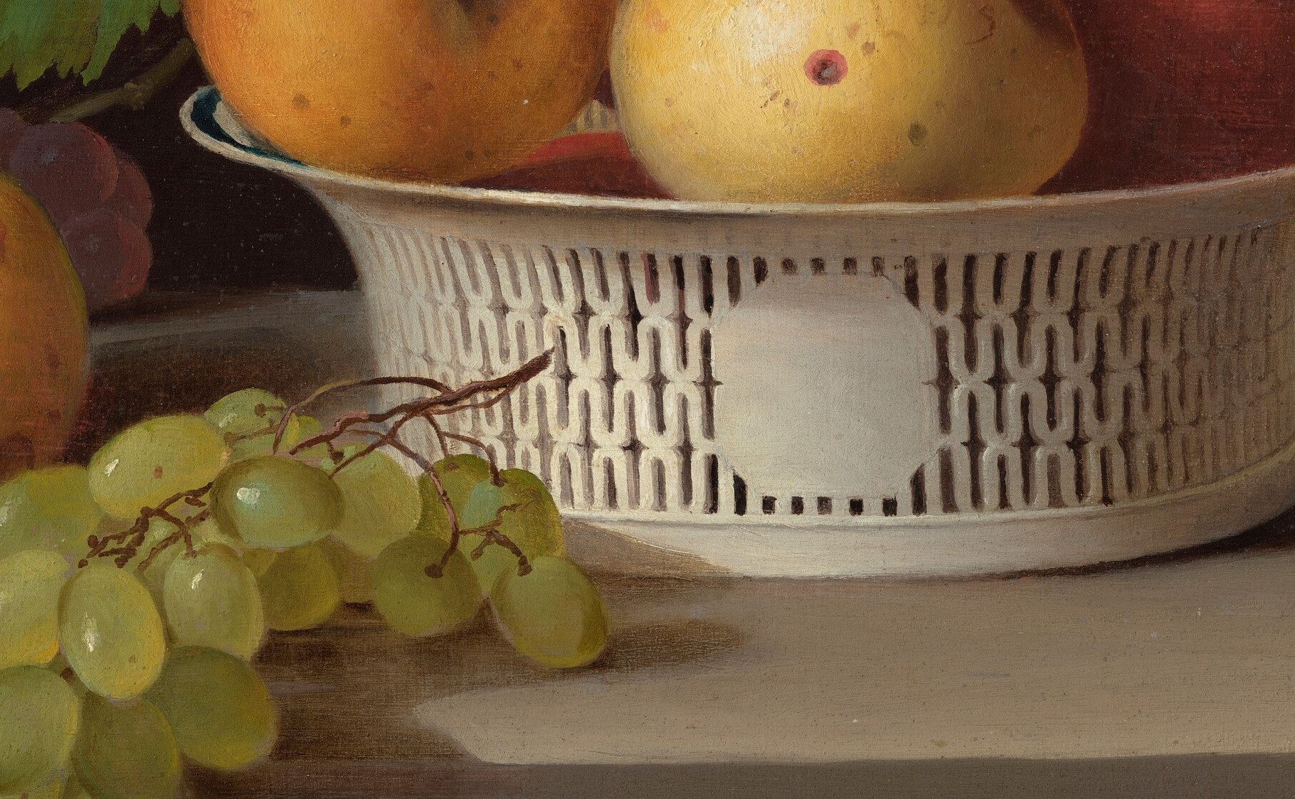 The basket is Chinese export porcelain, pierced by hand in Canton.