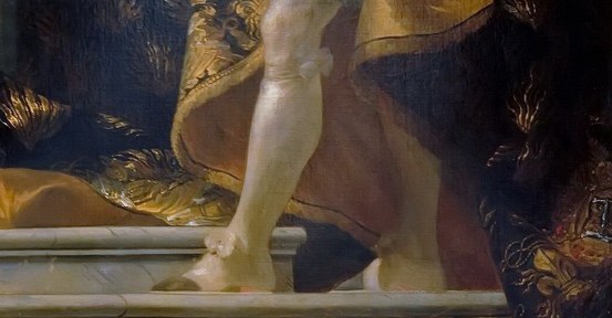 An ordinary dog moves up the grand steps.
