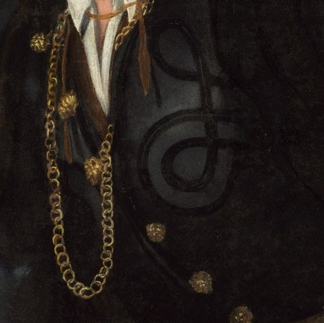 A gold chain signals his wealth.