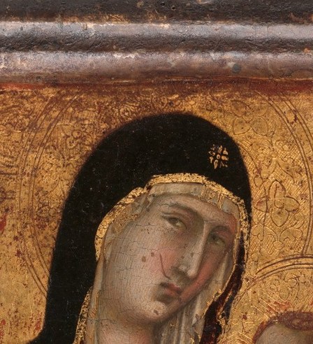 Now look at Christ's halo, right at the center of the gold.