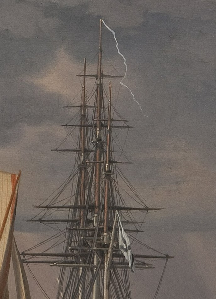 Shafts of light break through stormy clouds.