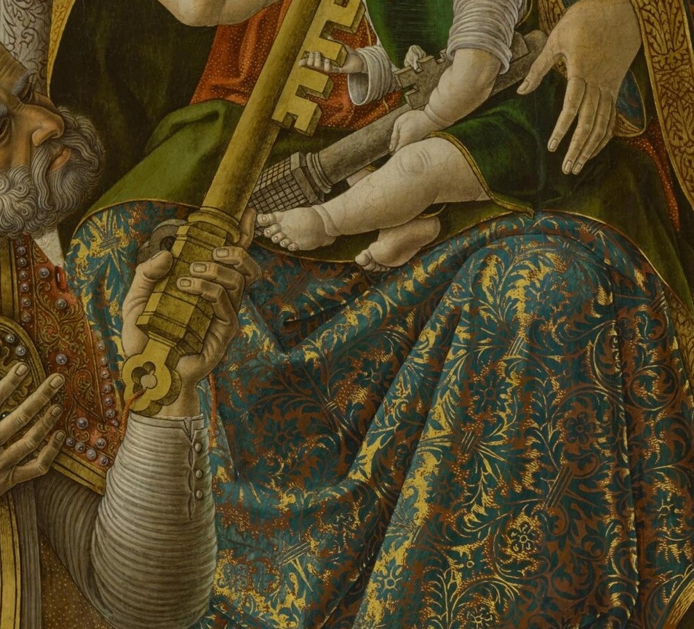 Notice the intricate pattern of the brocade fabric.