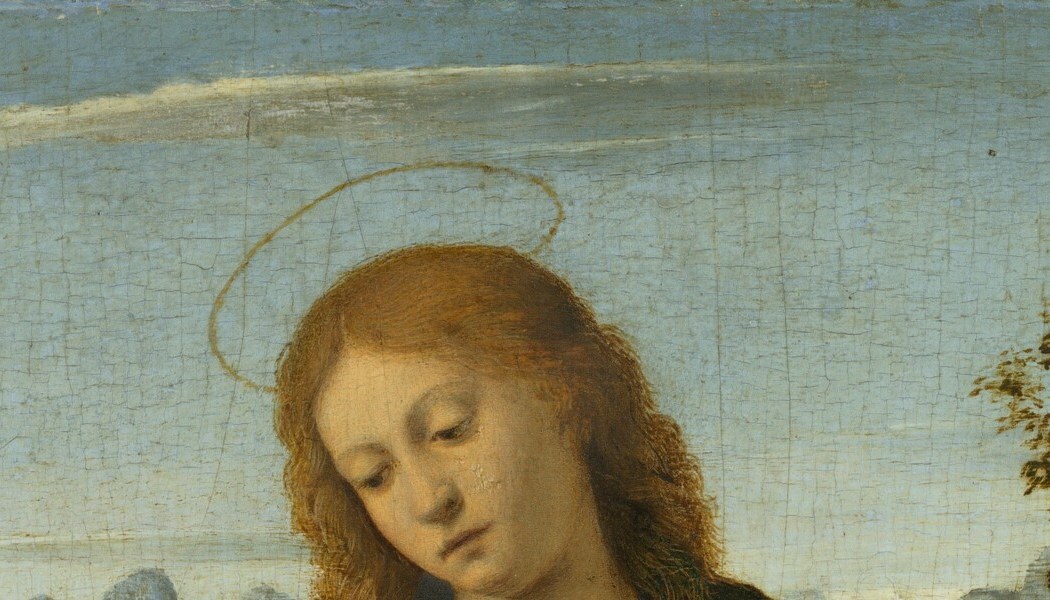A fine-line disc rather than a solid disk; against the blue sky it reads almost as a nimbus of light rather than a material object , Bellini's influence on Basaiti's sacred language.