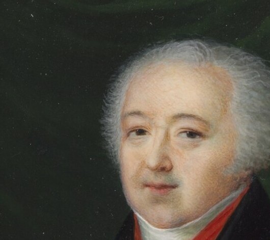The subject's pale, aged face with bushy white eyebrows and a subtle smile conveys a sense of quiet dignity and experience.