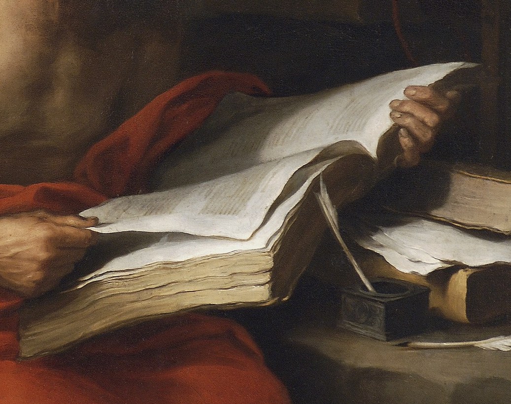 The large, well-worn book signifies his scholarly pursuits and the sacred texts he is studying.