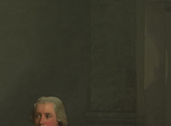 The man's expression is relaxed and slightly removed, suggesting educated leisure; the powdered wig dates the sitter precisely to the pre-revolutionary Georgian moment.