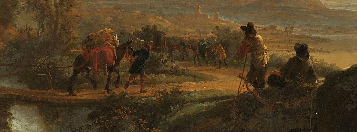 Mules travel on a distant path.