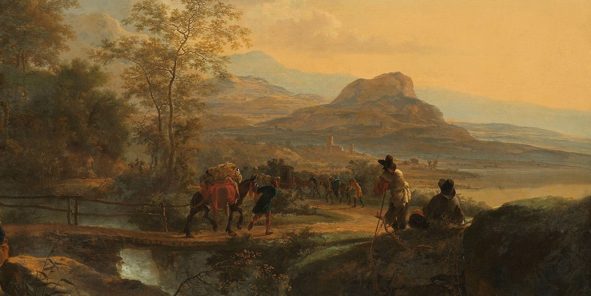 Warm light bathes distant mountains.