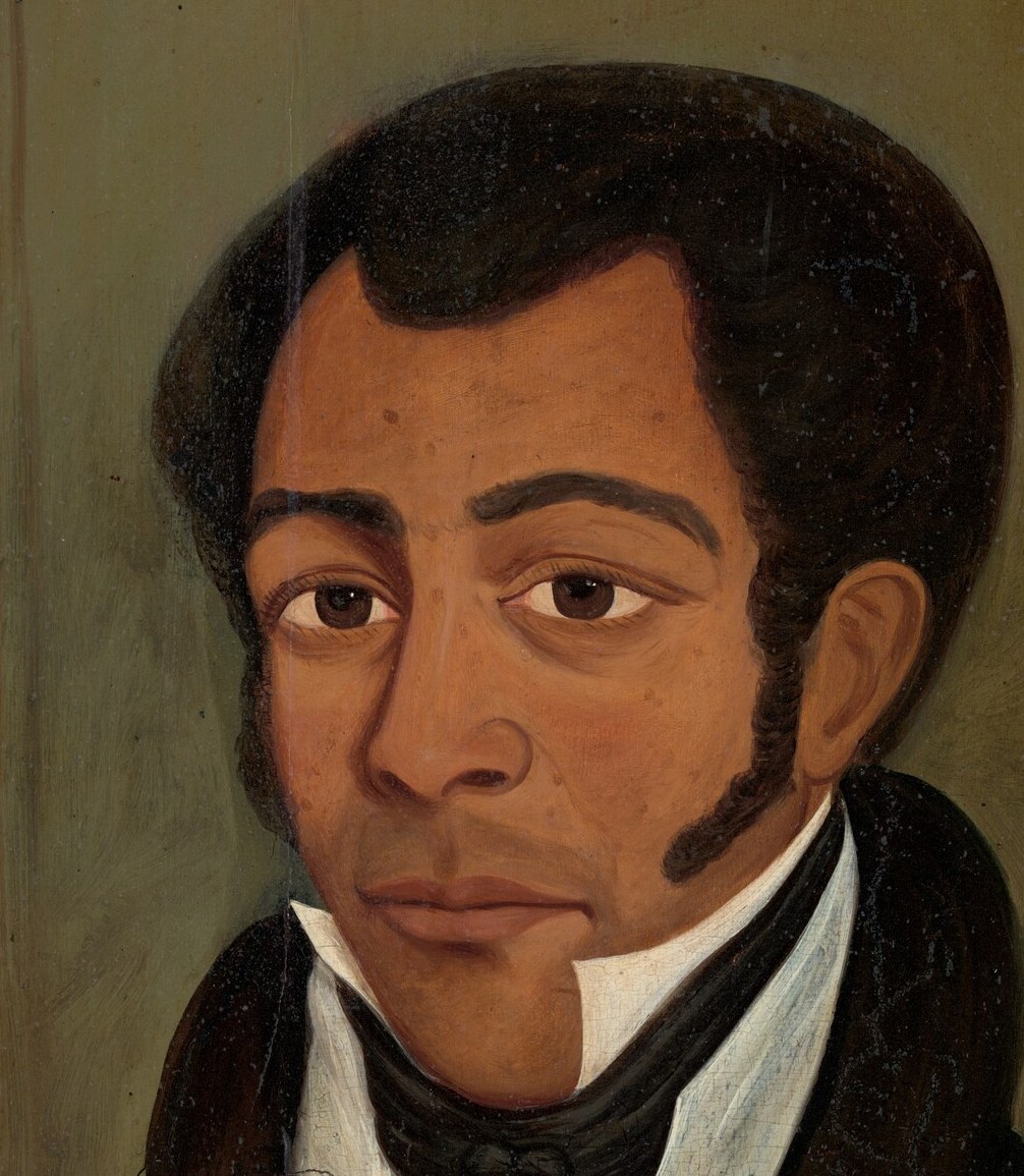 His direct gaze and serious expression convey a sense of gravitas and self-possession.