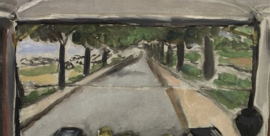 It's a view from inside his own car, on a road outside Paris.