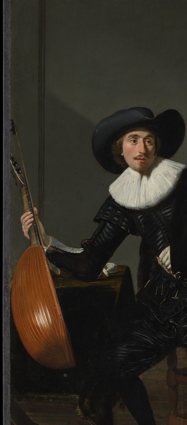 He holds a lute. Not just an instrument, a symbol of musical virtue.