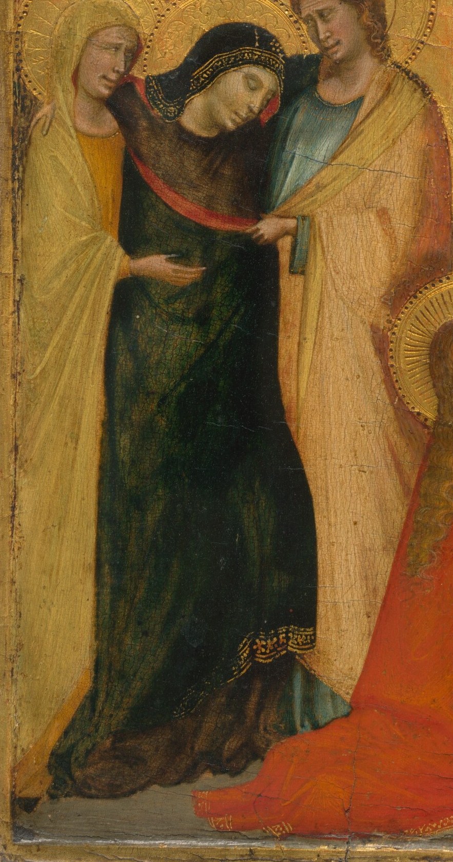 Now look to the left. Mary has physically collapsed into the arms of her companions.