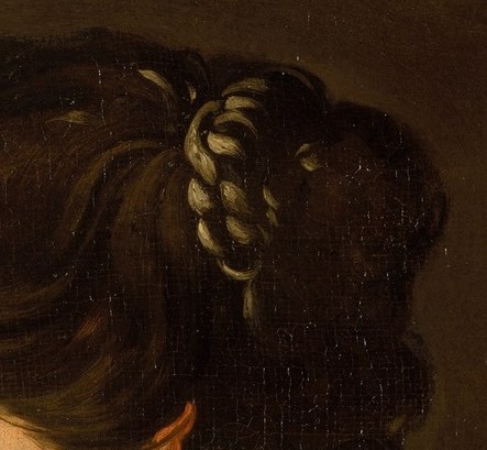 The hairstyle suggests a degree of formality or a specific period style.