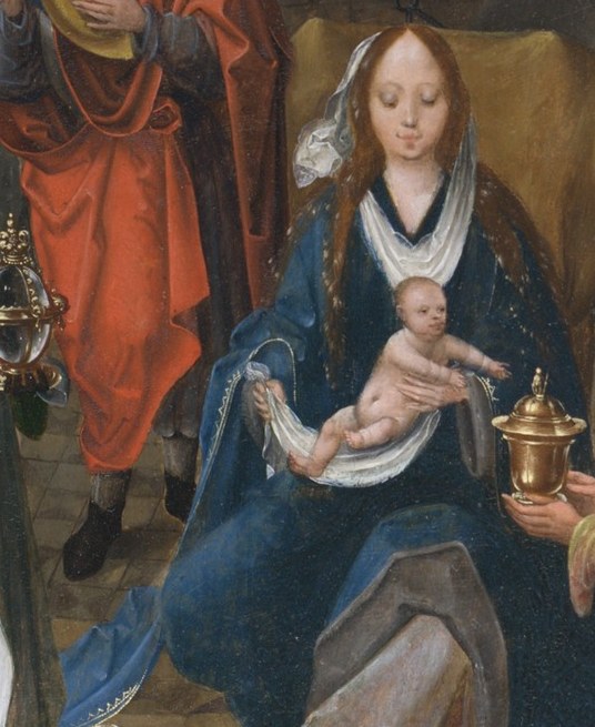 The bowed crown of an earthly king before a child is the central paradox of the Adoration; the crown glints gold