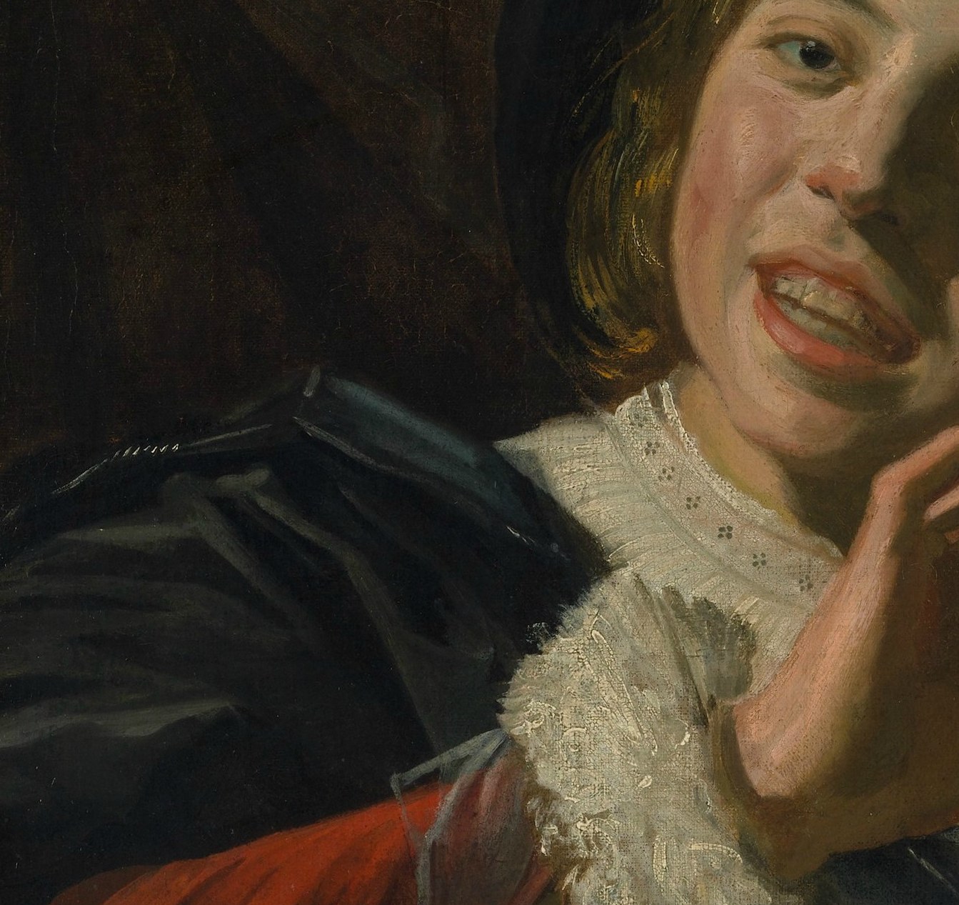 Look at his right hand. He tests a lute string with his fingernail.
