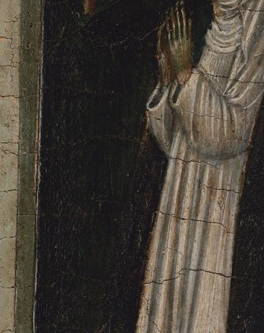 Her name is Catherine. She is negotiating with the figure in the doorway.