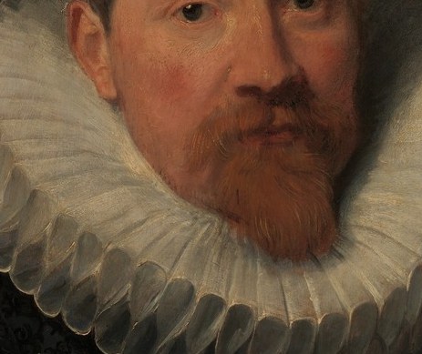 The precise grooming signals deliberate self-presentation; the slight graying at the edges lets viewers silently estimate the man's age and station.
