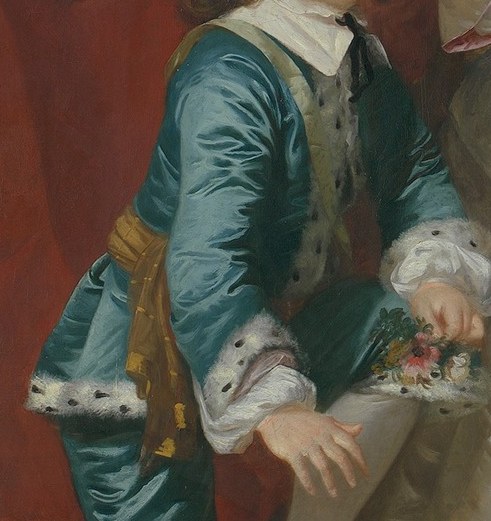 The boy's gentle hands and the little dog are the truth that lifts it.