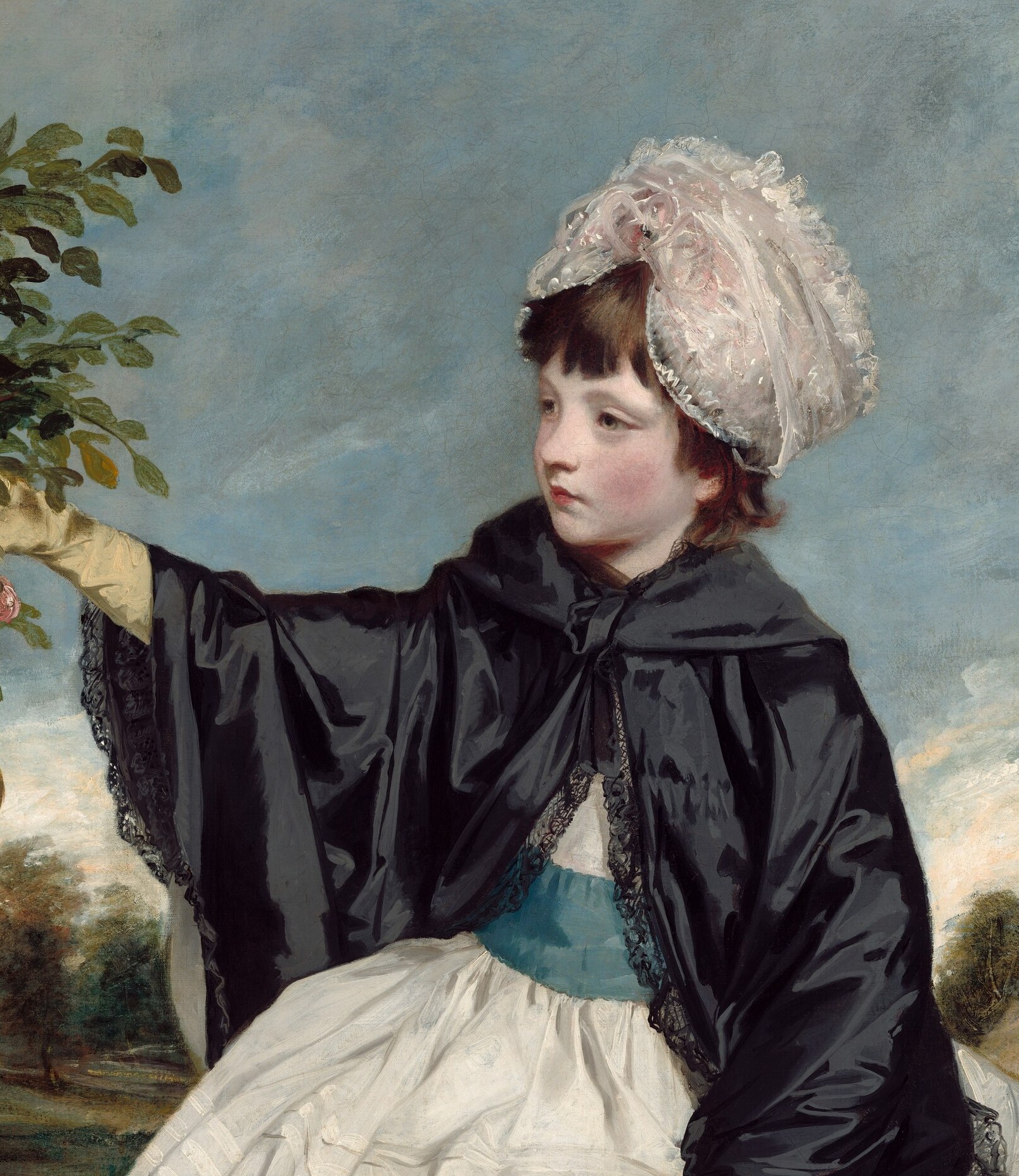 The stark cape creates the painting's dominant contrast , dark enveloping the child , and gives Reynolds a dramatic foil for the white dress beneath.