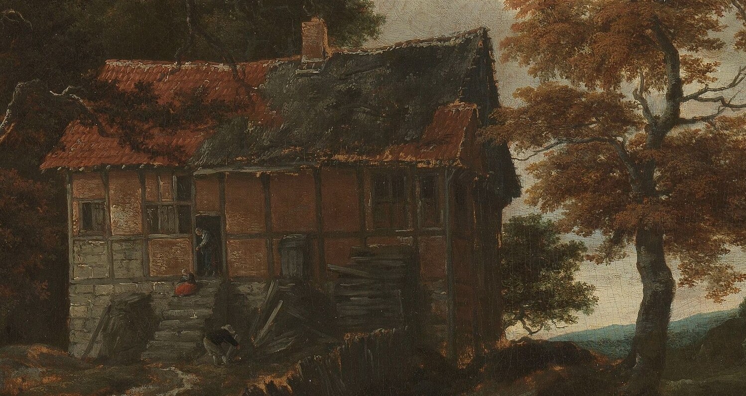 This dwelling, nestled into the rocky terrain, evokes a sense of human habitation and history within the wild landscape.