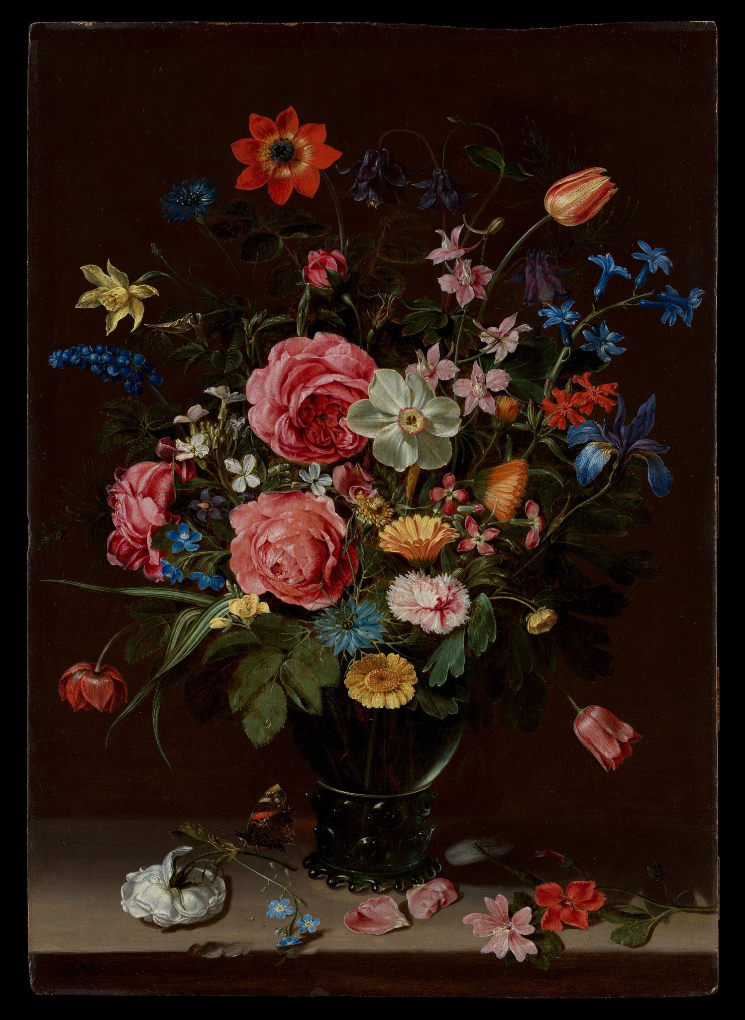 The deep, almost black background makes the vibrant colors of the flowers pop, enhancing their visual impact.