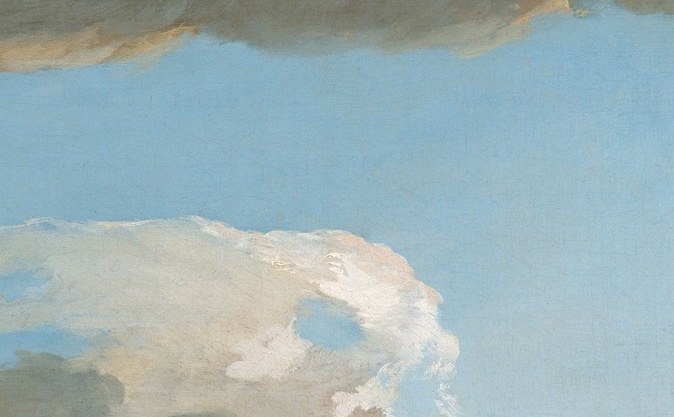 The dramatic clouds add atmospheric depth.