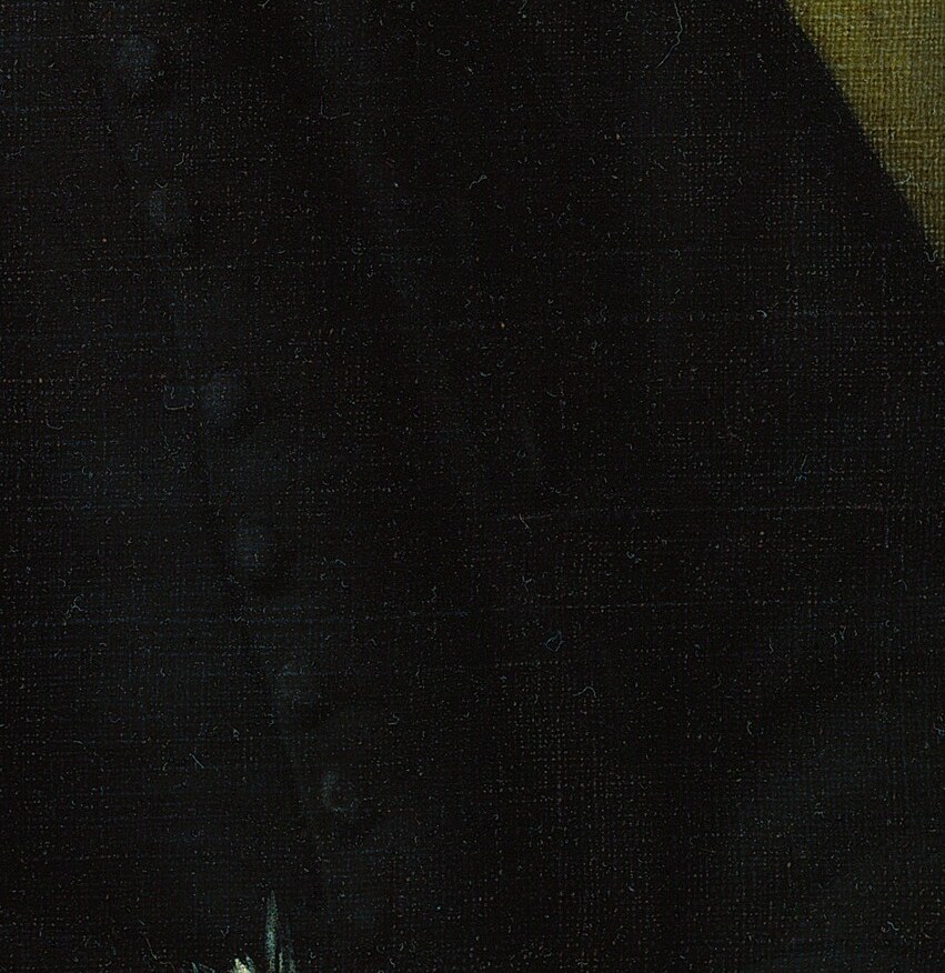 He wants you to notice the quill in his hand.