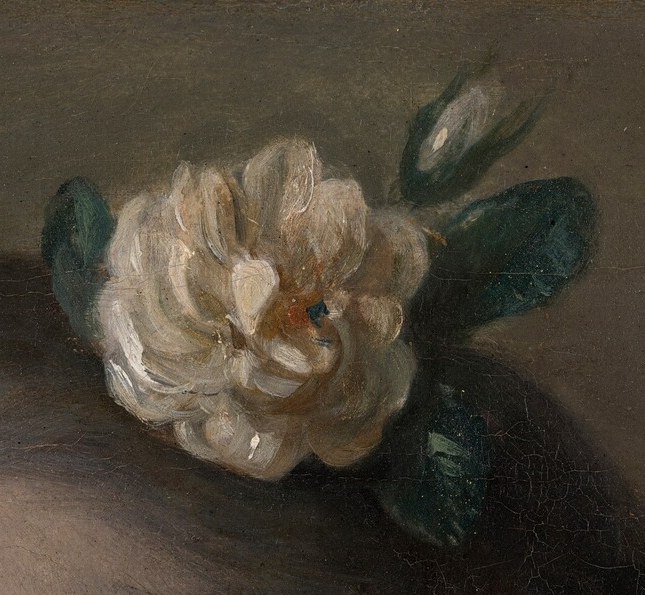 Her name is lost. We know only the flower in her hair.
