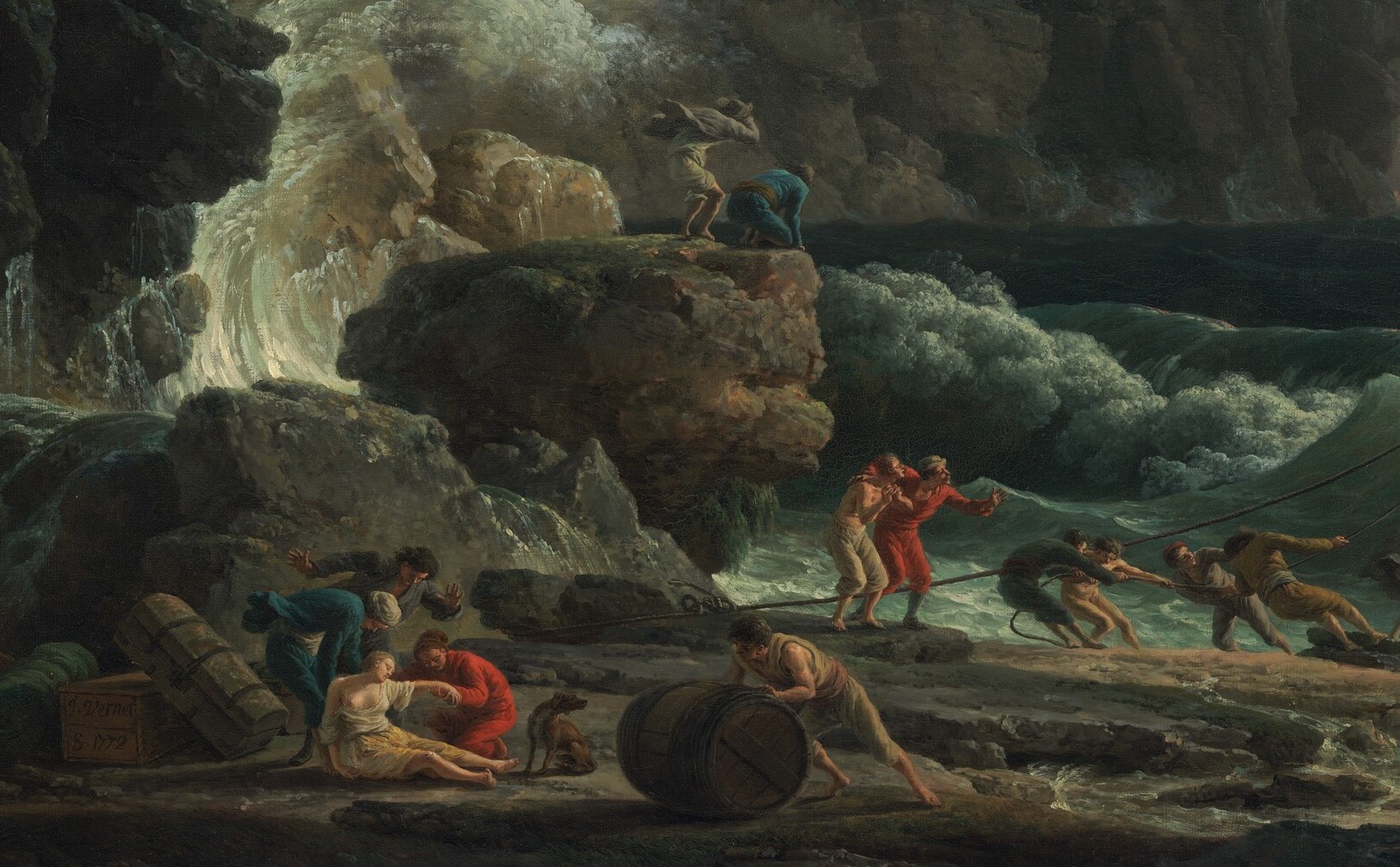 Everyone on shore is watching the same patch of sea.