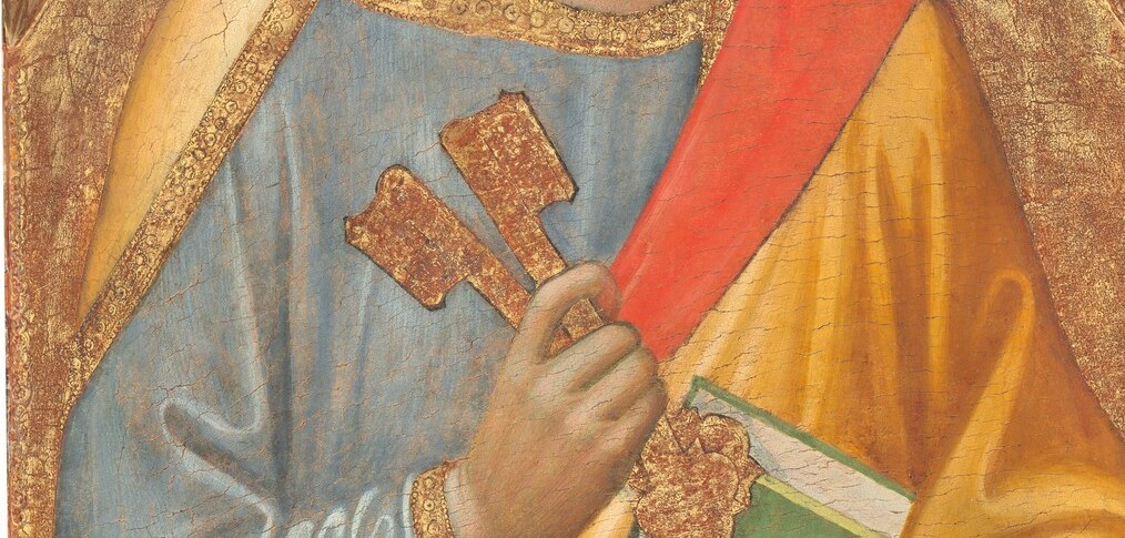 His weathered features and direct gaze suggest wisdom, authority, and a lifetime of devotion.