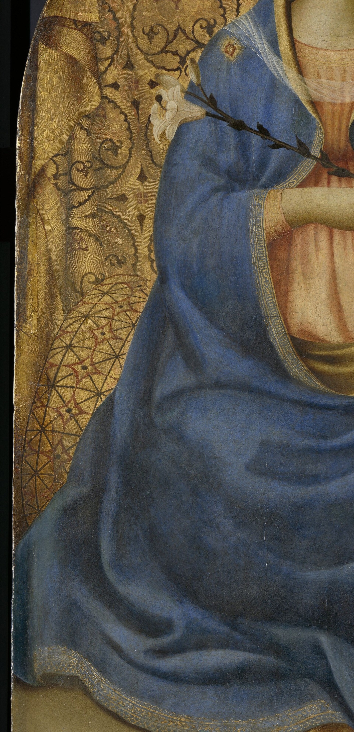 Fra Angelico uses azurite or lapis , the folds are volumetrically convincing for 1440, bridging Gothic flatness and Renaissance naturalism in a single garment.