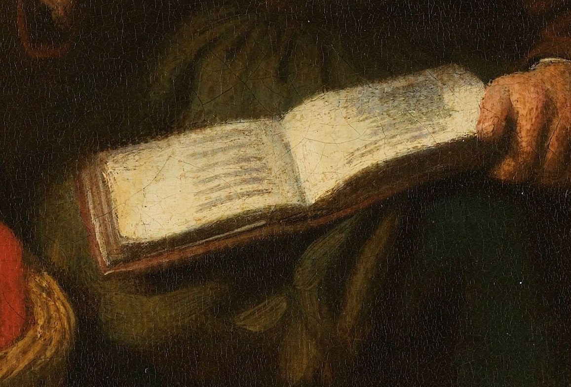 The light highlights the woman's face and the open book.