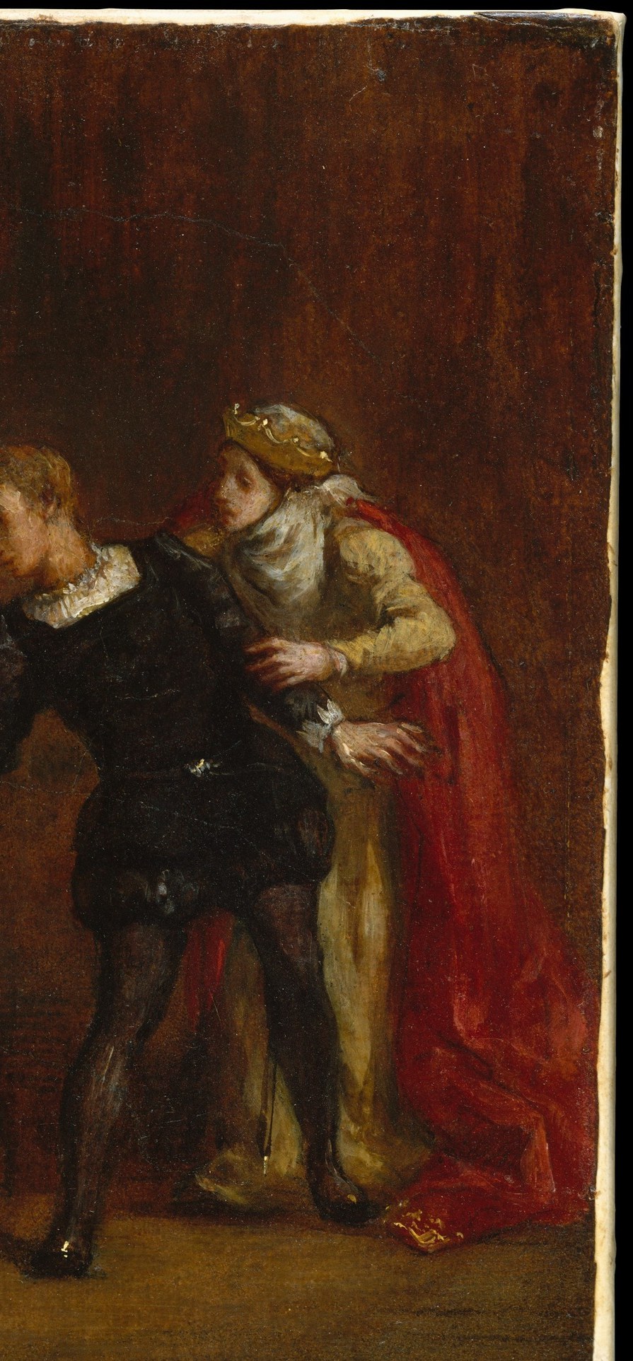 Behind it lies the body of Polonius, whom Hamlet just stabbed.