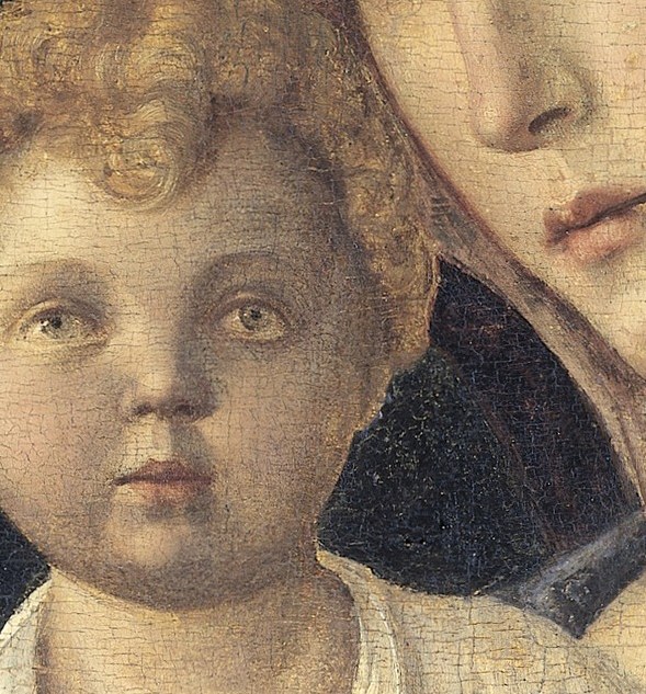 The Christ Child gazes out, engaging the viewer directly.
